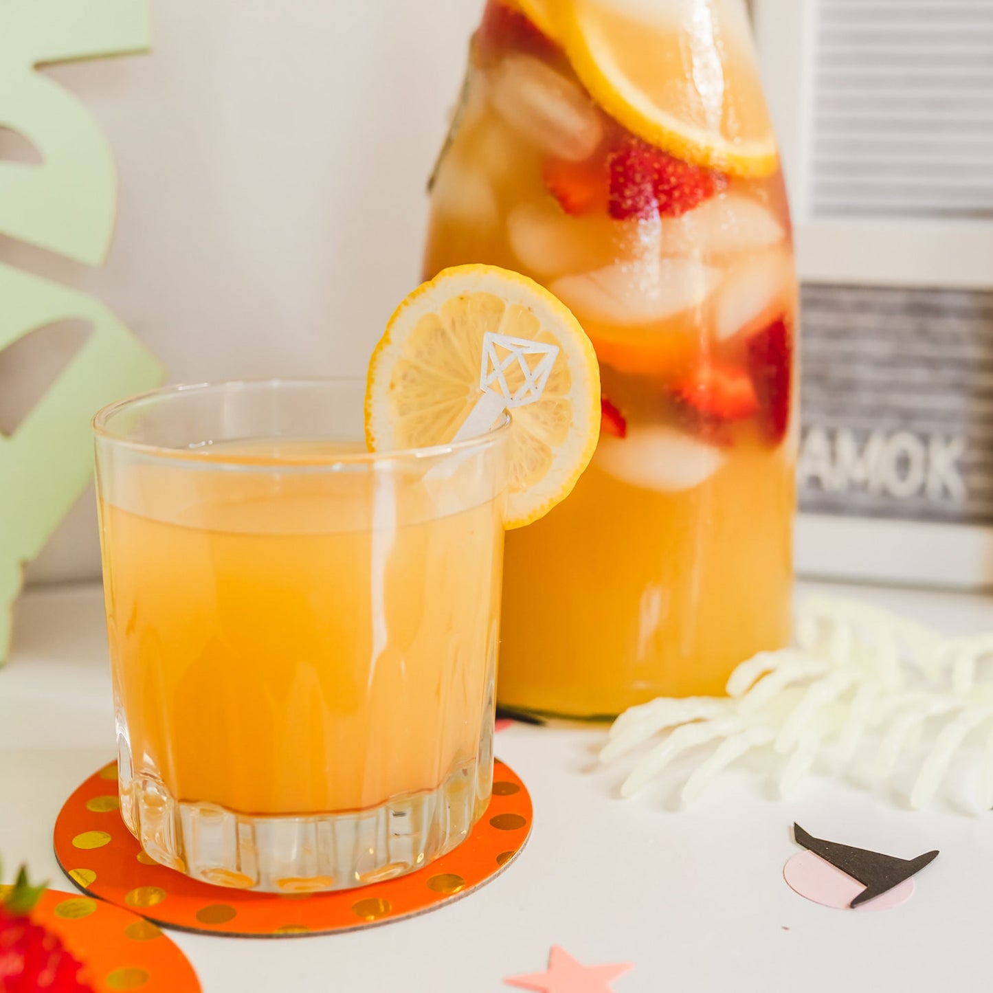 Stir Sticks - Geometric - white in orange juice - laser cut by LeeMo Designs in Bend, Oregon