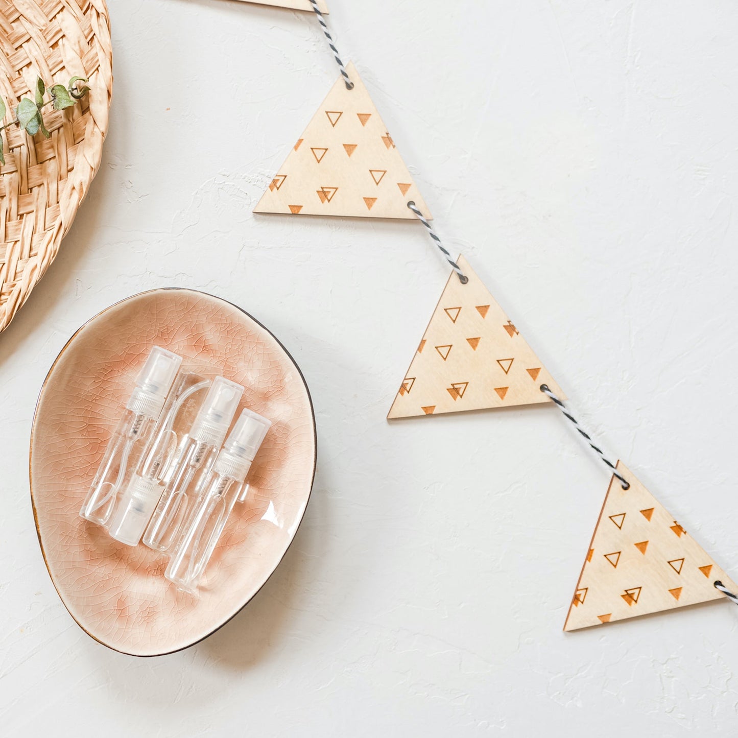 Wood Garland - triangle design laser cut and laser engraved in birch wood by LeeMo Designs in Bend, Oregon