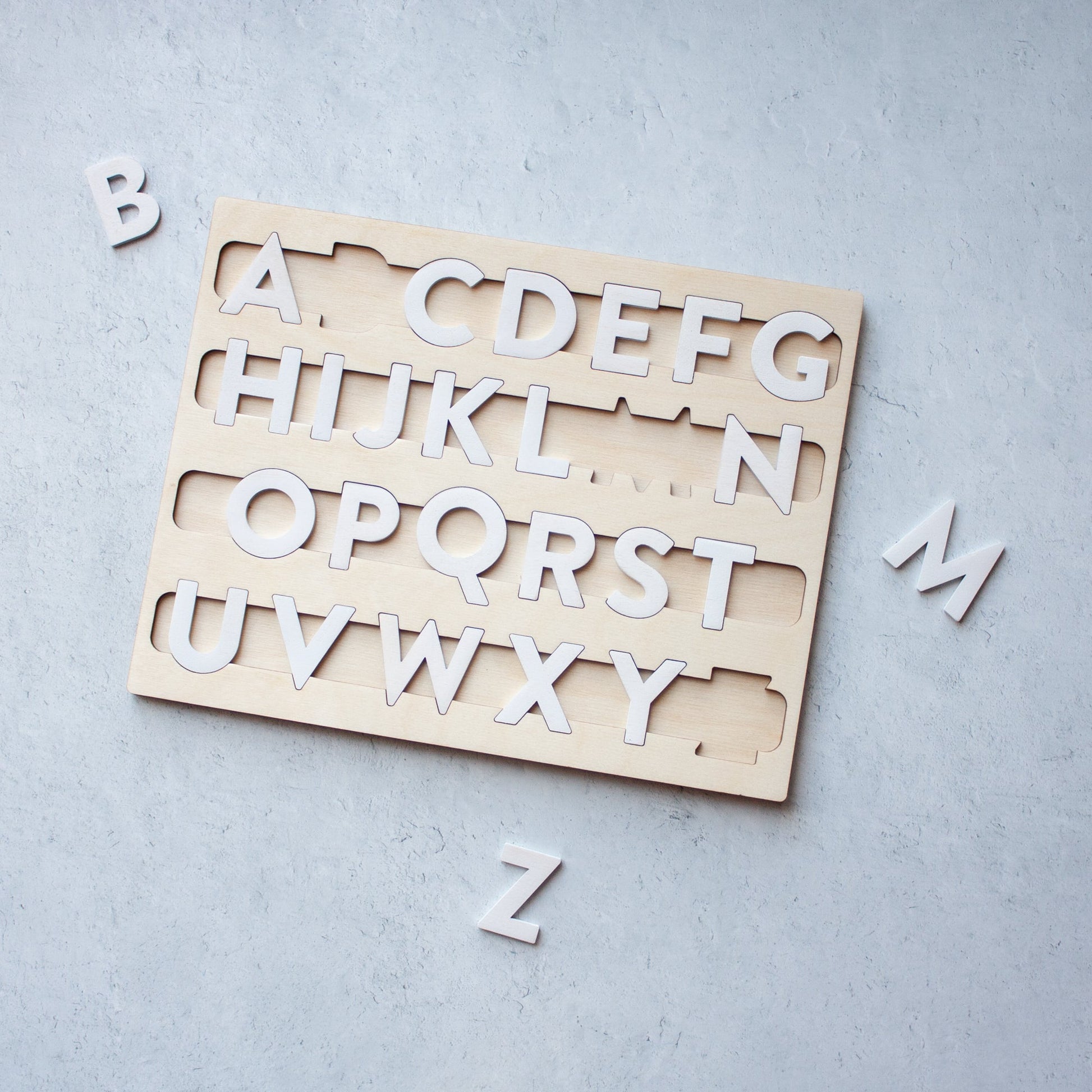 Alphabet Puzzle Learning Toy - laser cut alphabet jigsaw puzzle - by LeeMo Designs in Bend, Oregon