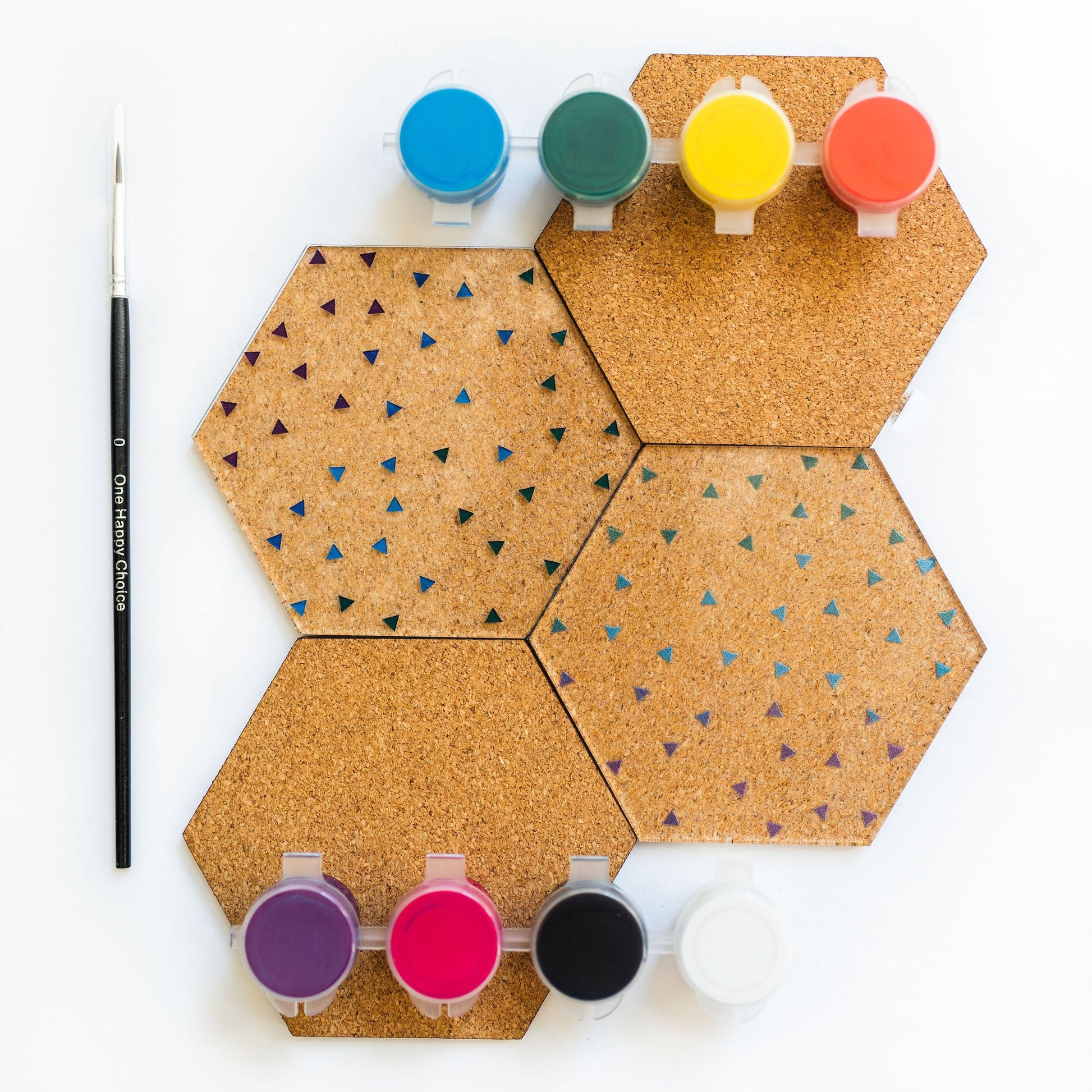 Adding cork backing to painted tiles to make coasters 