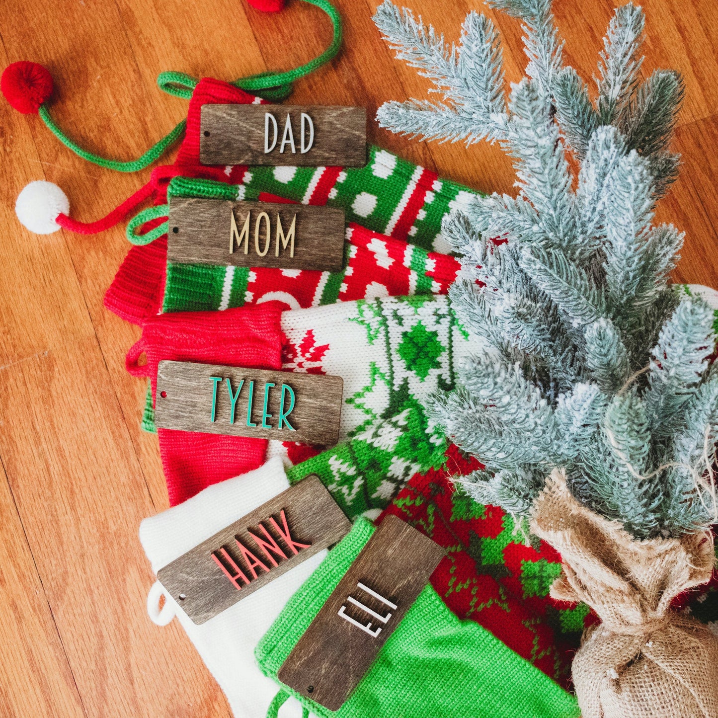 Personalized Wooden Stocking Tags, Modern Font - Dark Stained Laser Cut Wood with White, red, green, silver, gold lettering - by LeeMo Designs in Bend, Oregon