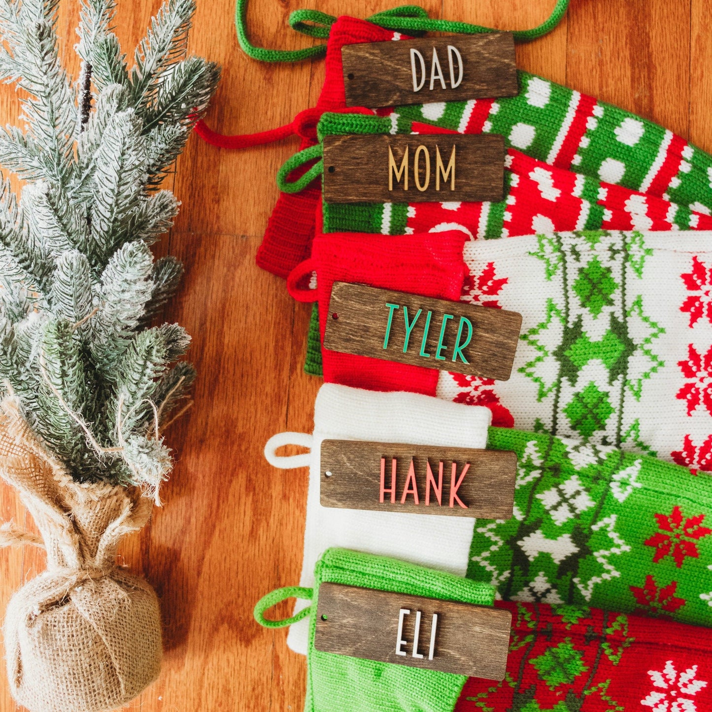 Personalized Wooden Stocking Tags, Modern Font - Dark Stained Laser Cut Wood with White, red, green, silver, gold lettering - by LeeMo Designs in Bend, Oregon