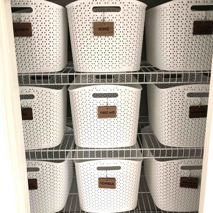 Hooked Labels for Storage Bin Organization - Walnut Wood Closet Clean Font hanging from white baskets - by LeeMo Designs in Bend, Oregon