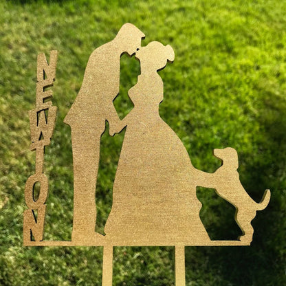 Personalized Laser Cut Cake Toppers by LeeMo Designs in Bend, Oregon | 'NEWTON' with couple kissing and dog in Gold