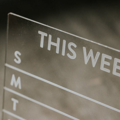 Dry-Erase Weekly Calendar - laser cut and laser engraved clear acrylic with solid wood base - by LeeMo Designs in Bend, Oregon