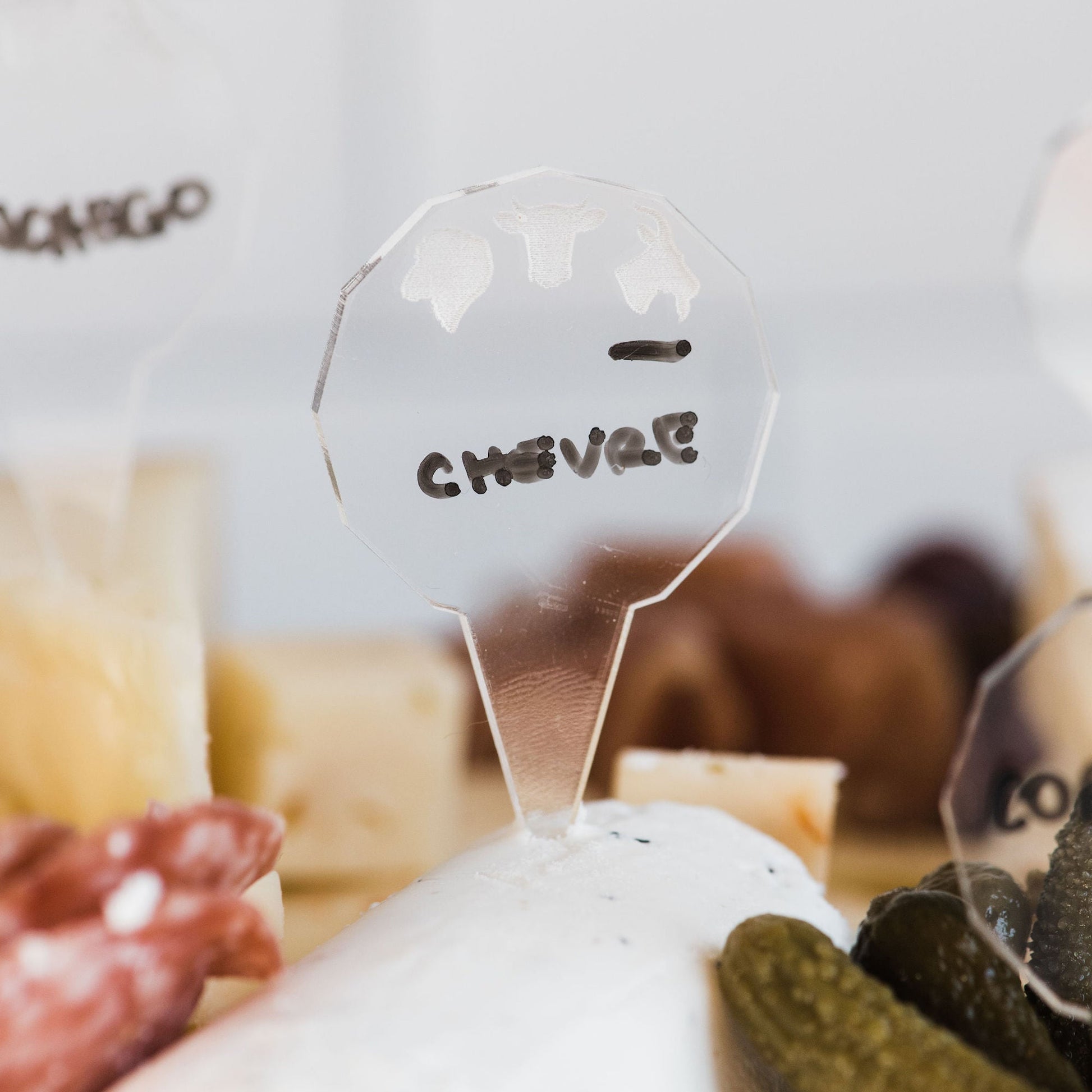 Dry-Erase Cheese labels - laser cut clear acrylic with animal heads - by LeeMo Designs in Bend, Oregon